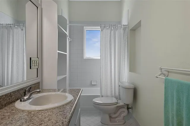 a view of a house with a big yard