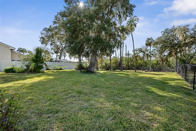 an aerial view of residential house with outdoor space