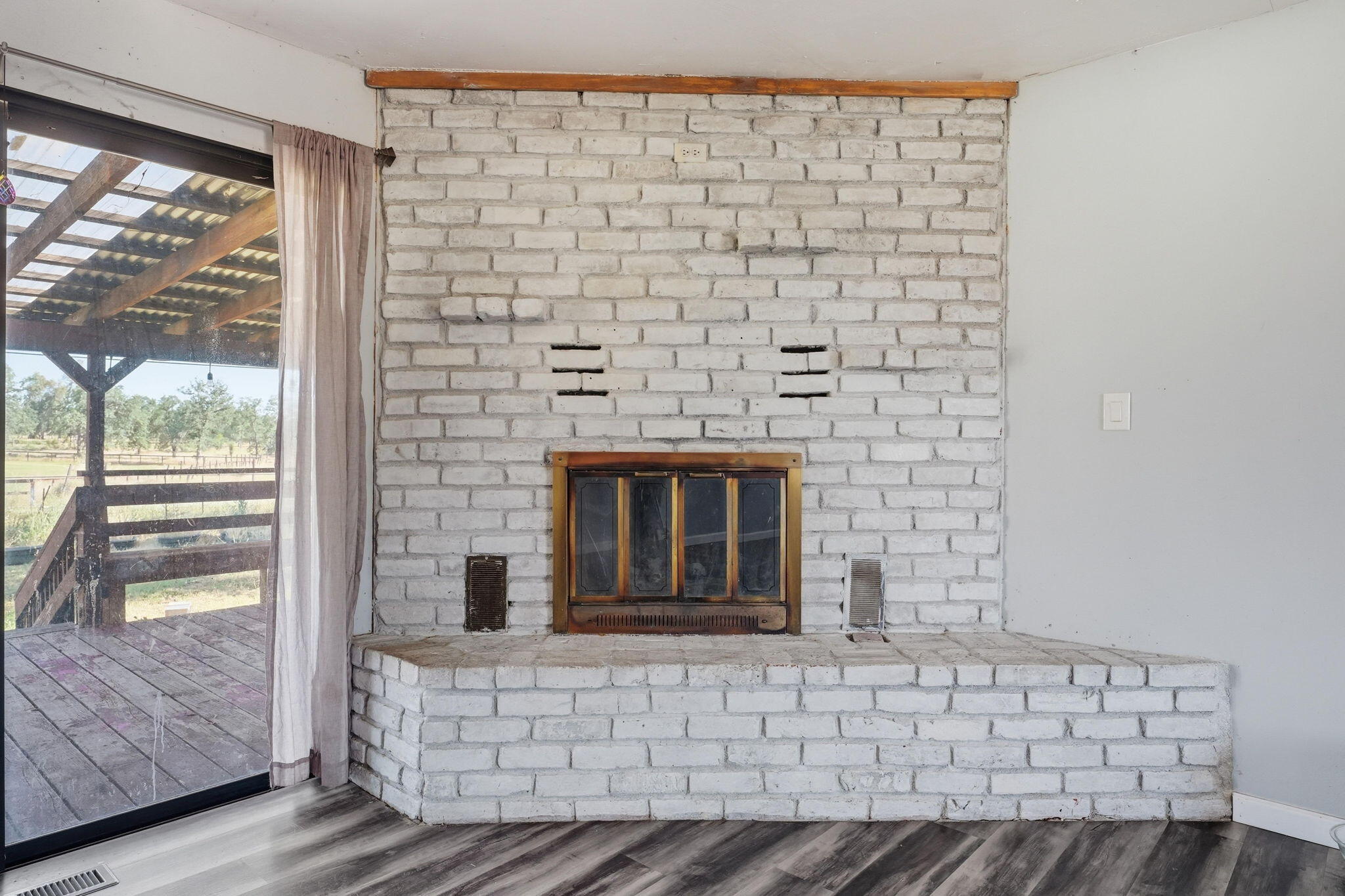 22189 Old Alturas Road Redding, CA 96003 - Photo 12 of 70 a brick oven with a fireplace
