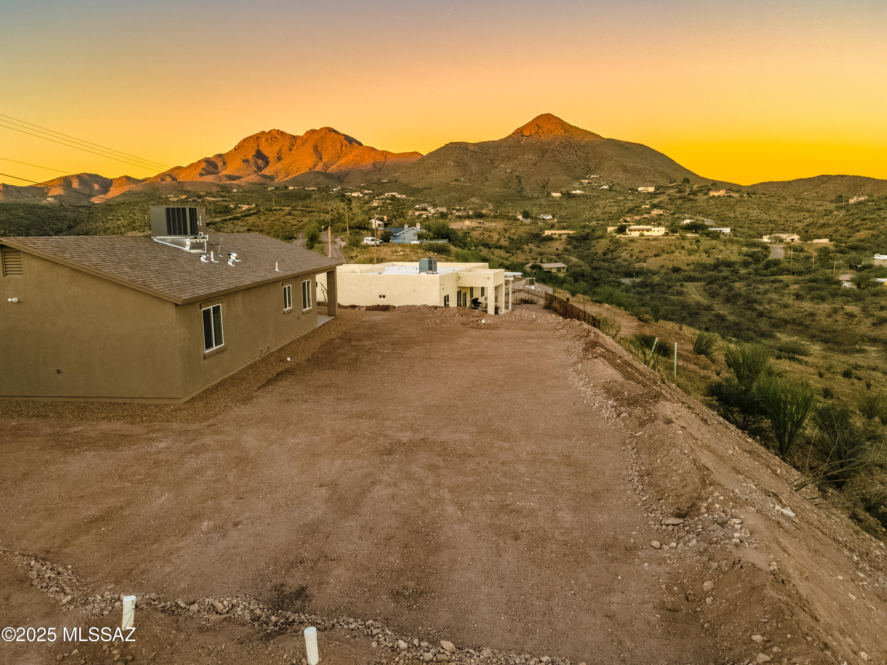 329 Camino Magnifico Rio Rico, AZ 85648 - Photo 41 of 47 a view of a house with a mountain