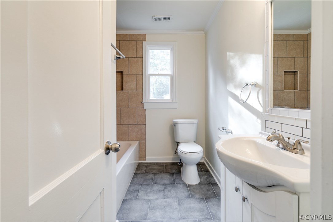 2901 West Strathmore Road North Chesterfield, VA 23237 - Photo 13 of 36 a bathroom with a sink toilet and shower