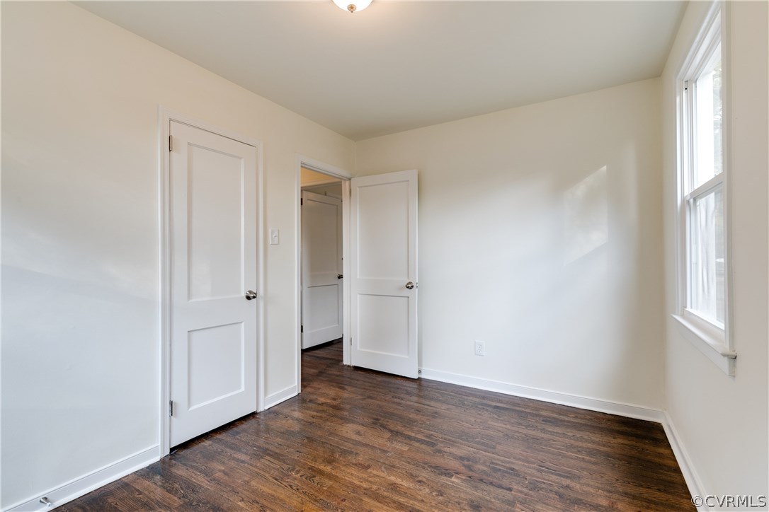 2901 West Strathmore Road North Chesterfield, VA 23237 - Photo 17 of 36 a view of empty room with wooden floor and window