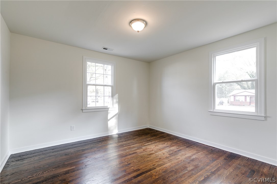2901 West Strathmore Road North Chesterfield, VA 23237 - Photo 18 of 36 an empty room with wooden floor and windows
