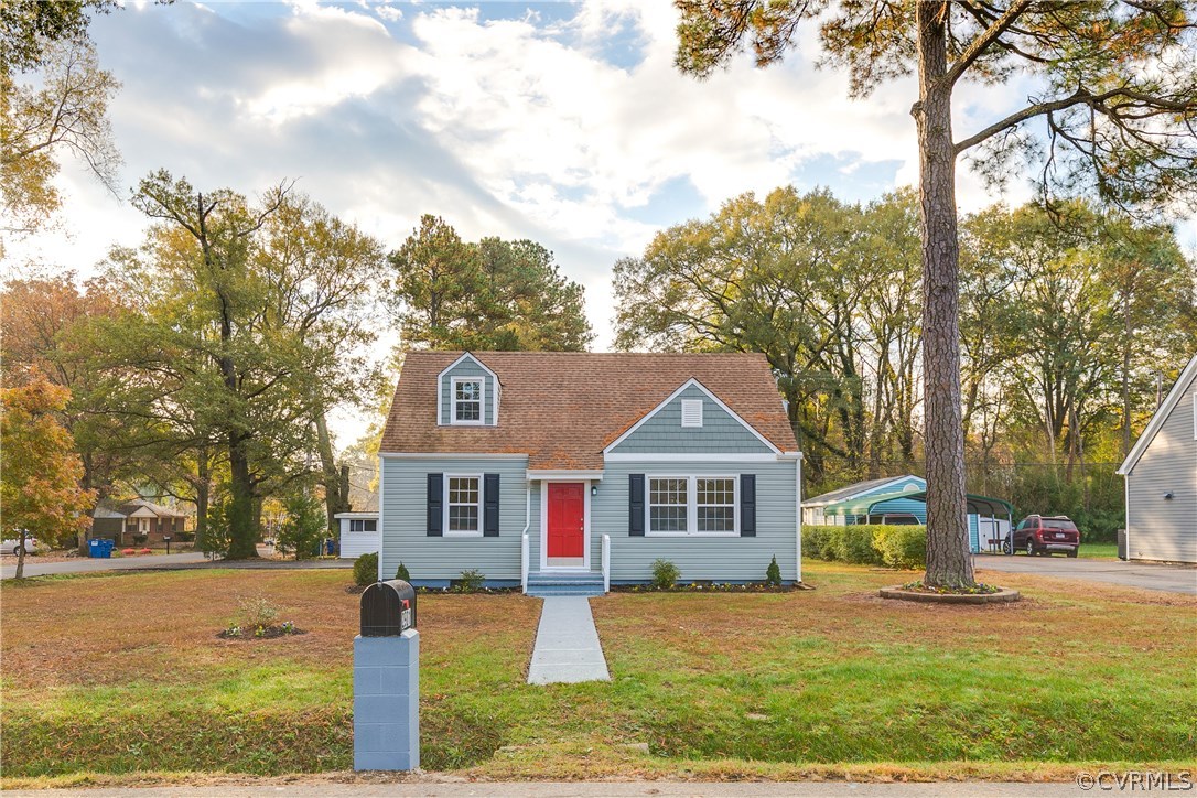 2901 West Strathmore Road North Chesterfield, VA 23237 - Photo 2 of 36 a front view of a house with a yard and trees