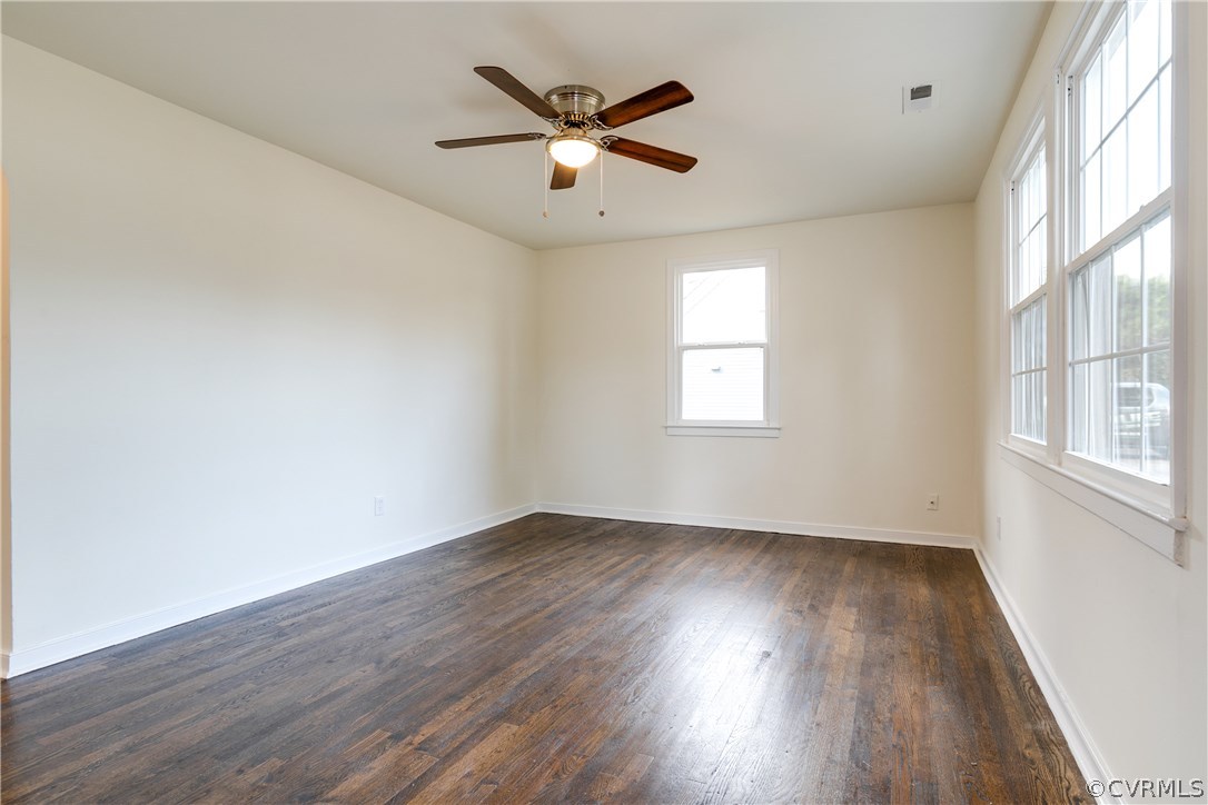 2901 West Strathmore Road North Chesterfield, VA 23237 - Photo 4 of 36 an empty room with wooden floor and windows
