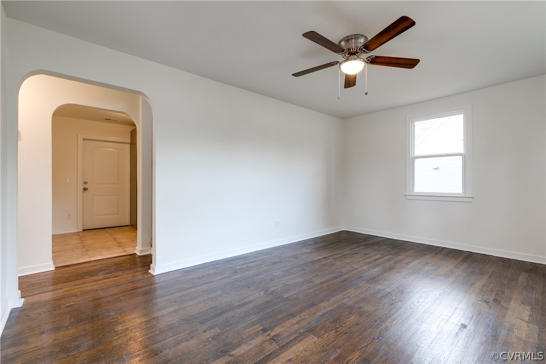 2901 West Strathmore Road North Chesterfield, VA 23237 - Photo 6 of 36 an empty room with wooden floor and a ceiling fan