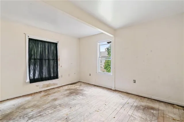 an empty room with windows