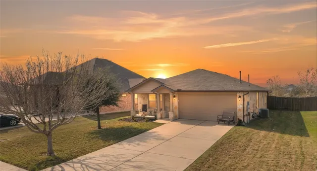 a very nice looking house with a large window