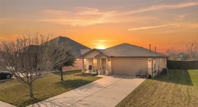 a very nice looking house with a large window