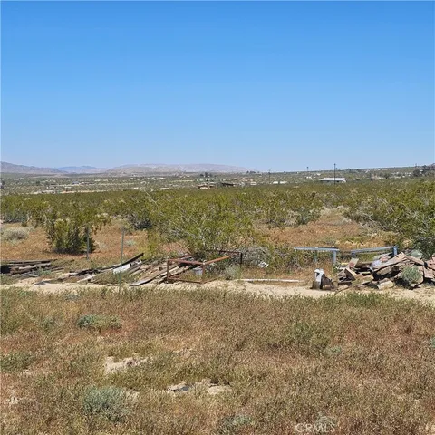 an aerial view of residential building and ocean