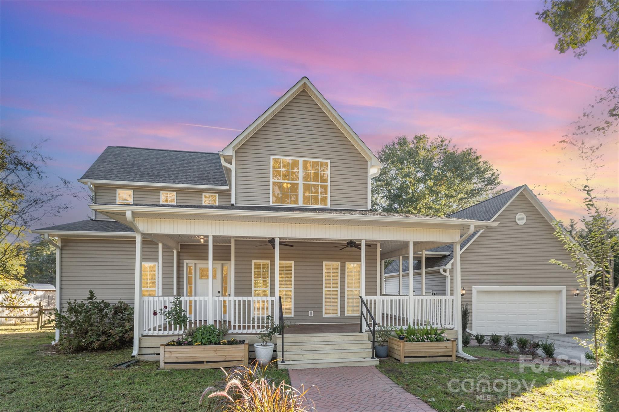 front view of a house with a yard