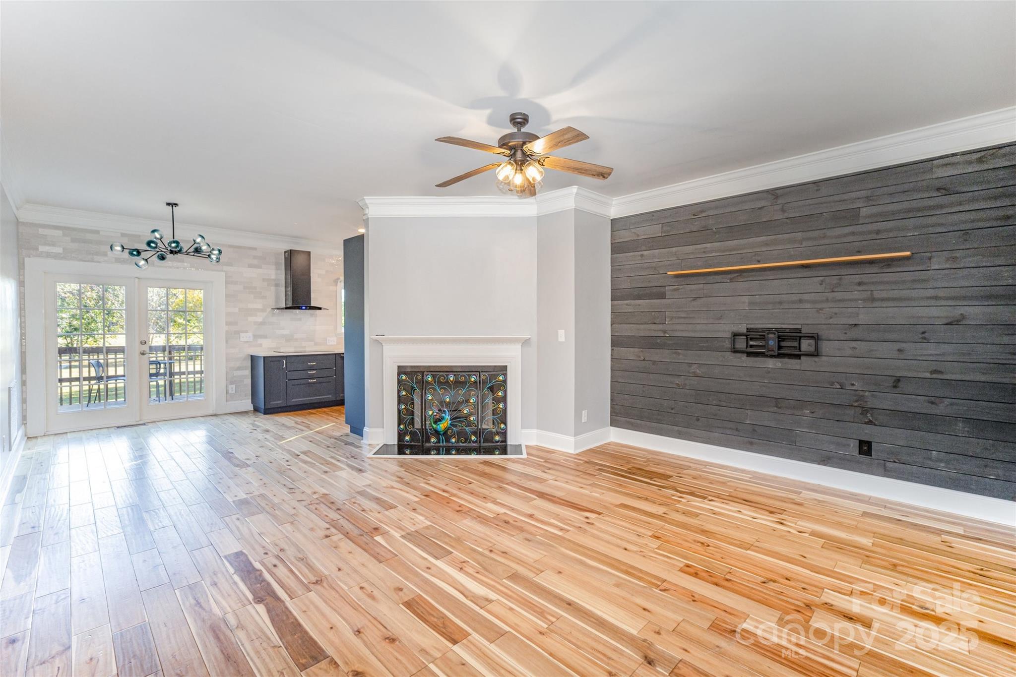 2870 Harmony Road Rock Hill, SC 29730 - Photo 15 of 29 a view of empty room with wooden floor and fan