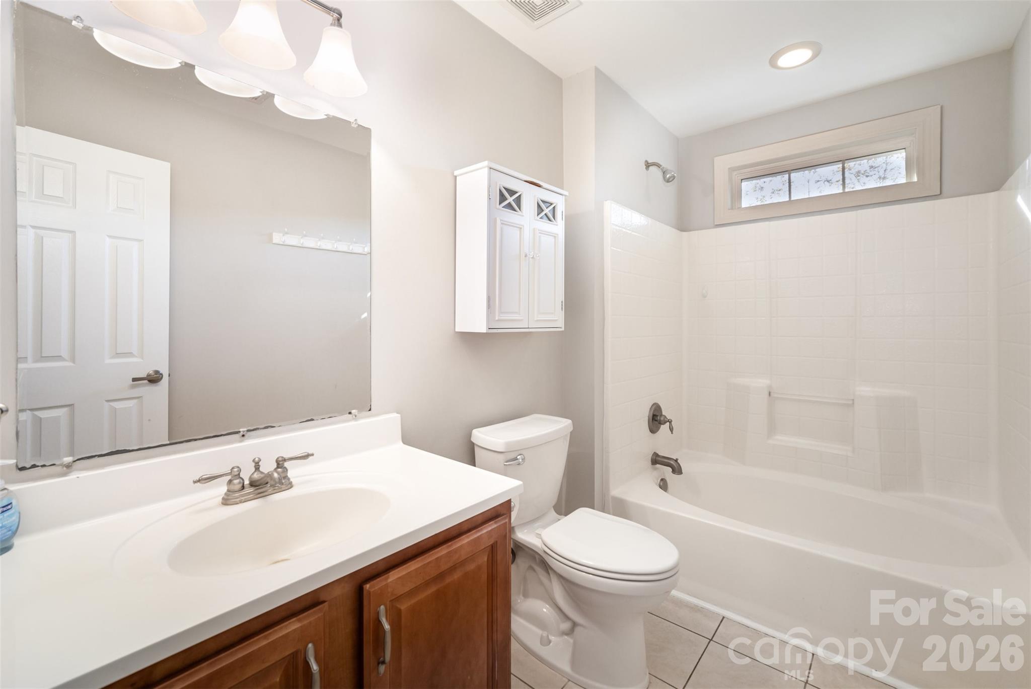 2870 Harmony Road Rock Hill, SC 29730 - Photo 15 of 26 a bathroom with a sink a toilet and shower