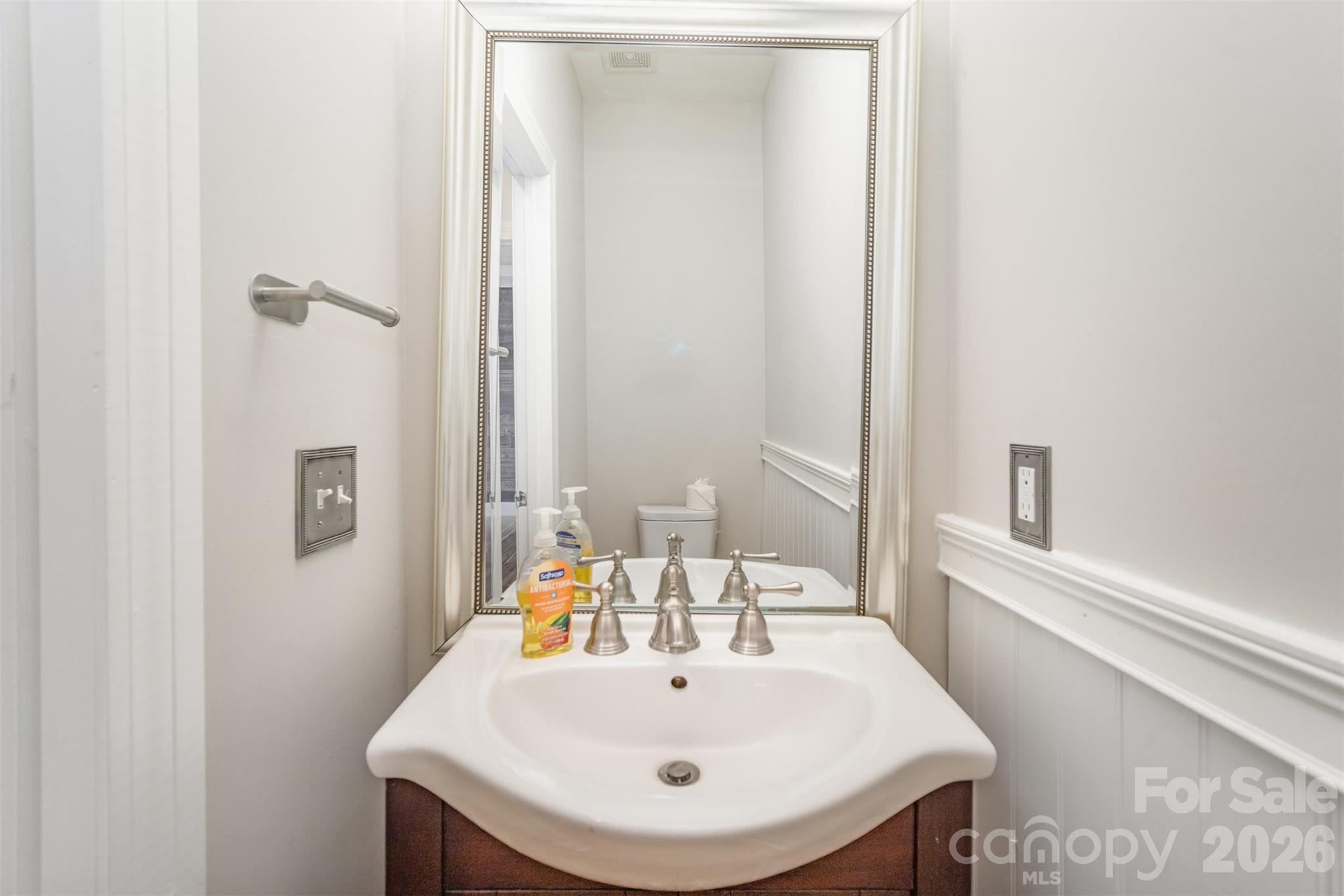 2870 Harmony Road Rock Hill, SC 29730 - Photo 16 of 26 a bathroom with a sink and a mirror