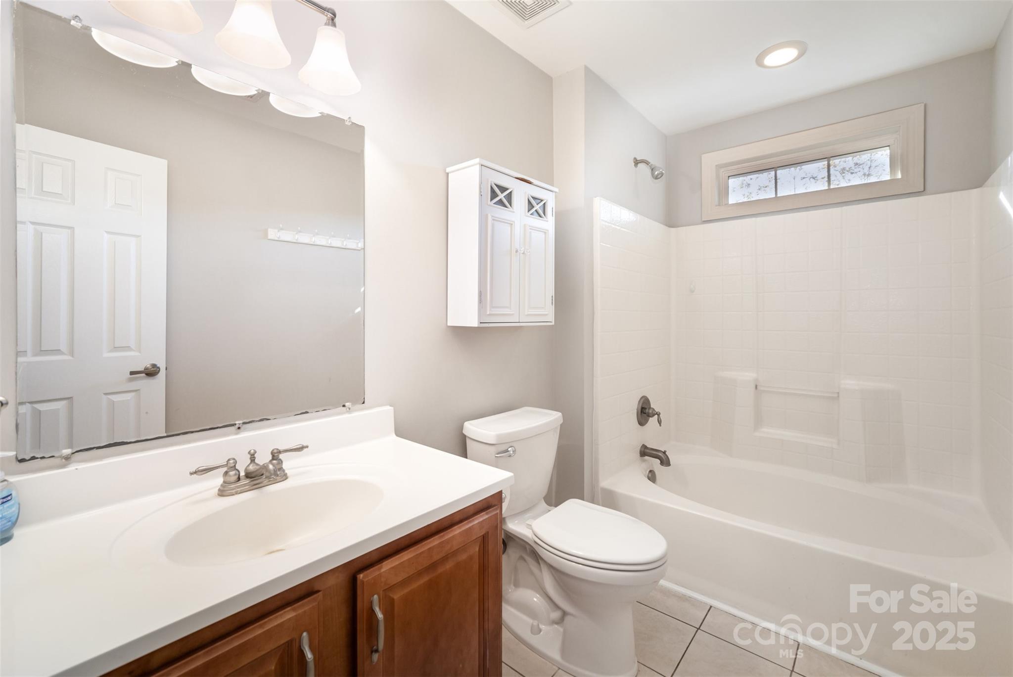 2870 Harmony Road Rock Hill, SC 29730 - Photo 18 of 29 a bathroom with a sink a toilet and shower