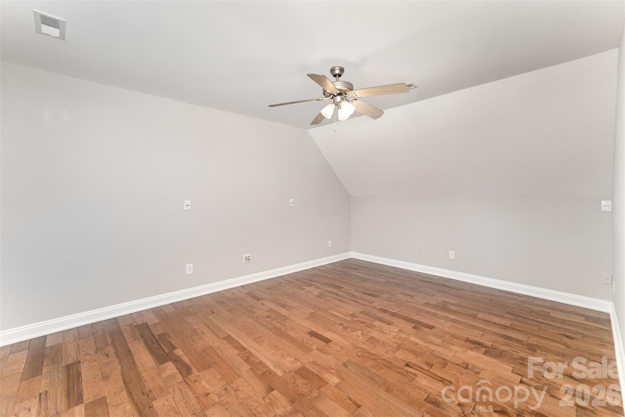 2870 Harmony Road Rock Hill, SC 29730 - Photo 19 of 26 a view of empty room with wooden floor