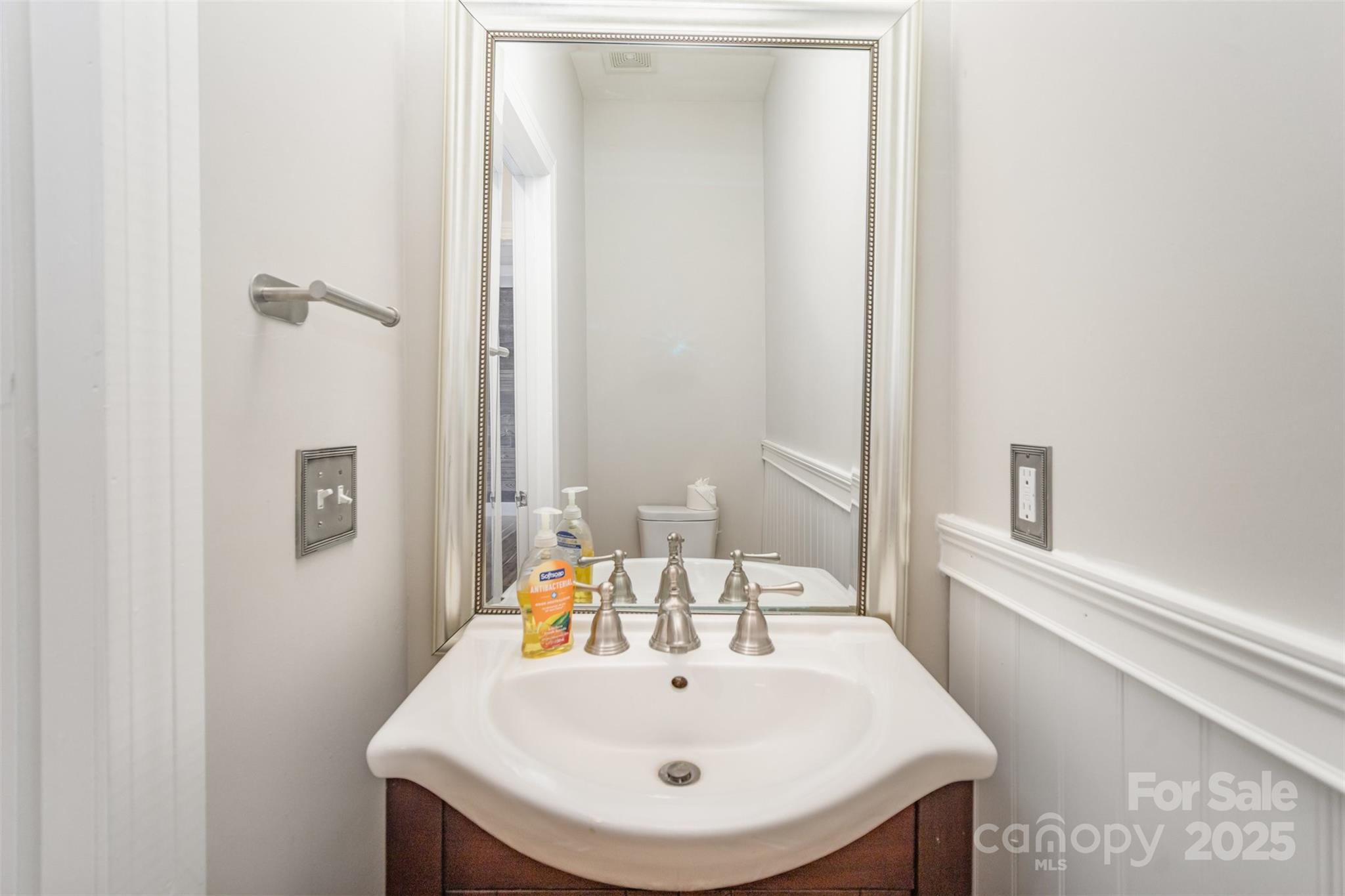 2870 Harmony Road Rock Hill, SC 29730 - Photo 19 of 29 a bathroom with a sink and a mirror