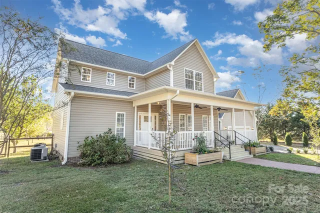 a view of balcony with wooden floor