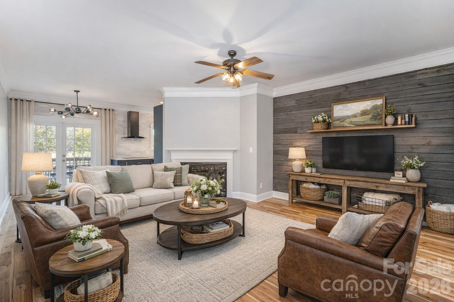 2870 Harmony Road Rock Hill, SC 29730 - Photo 4 of 26 a living room with furniture a flat screen tv and a fireplace