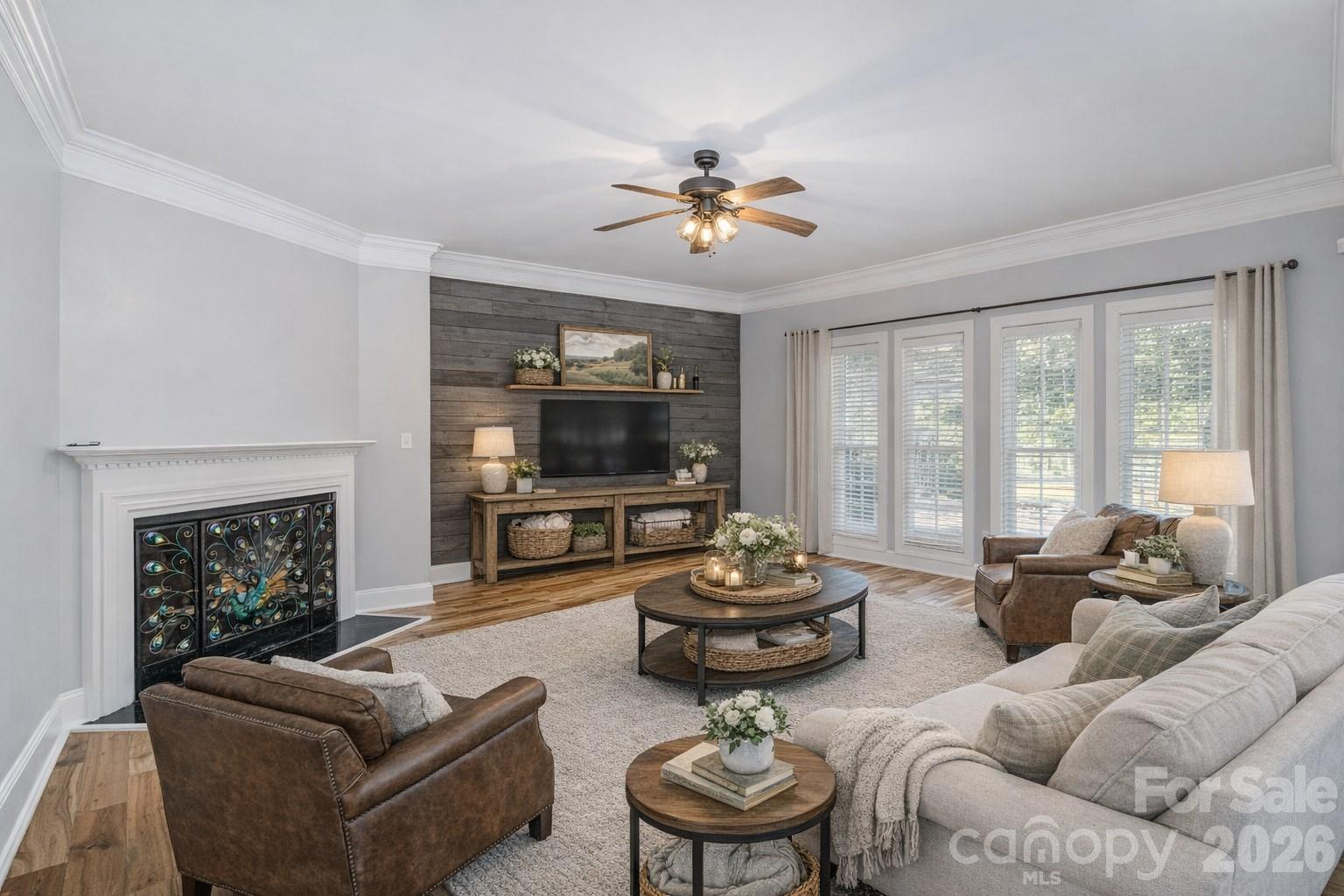 2870 Harmony Road Rock Hill, SC 29730 - Photo 5 of 26 a living room with furniture a fireplace and a flat screen tv