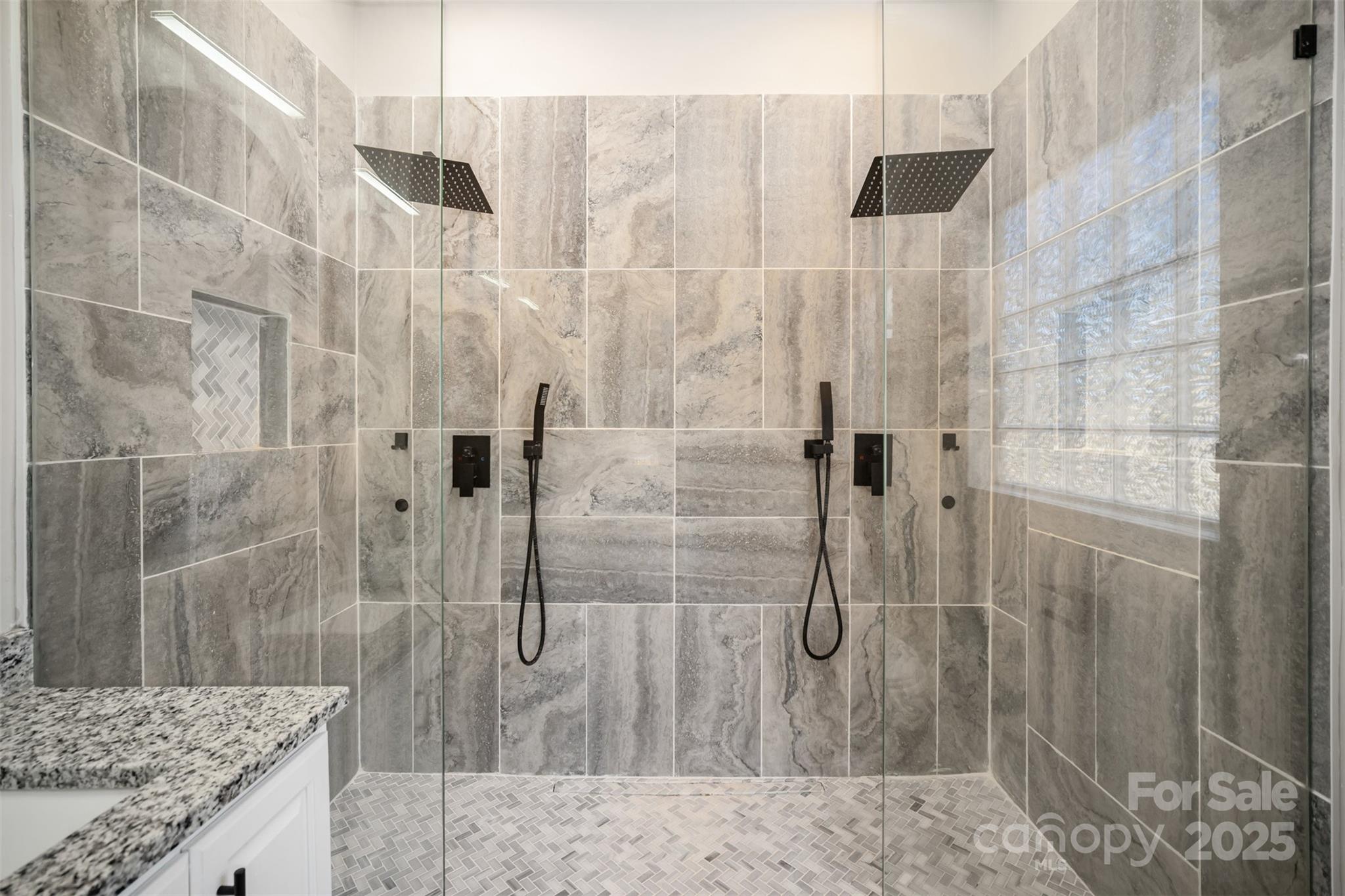 2870 Harmony Road Rock Hill, SC 29730 - Photo 6 of 29 a bathroom with a granite countertop shower a sink and a mirror