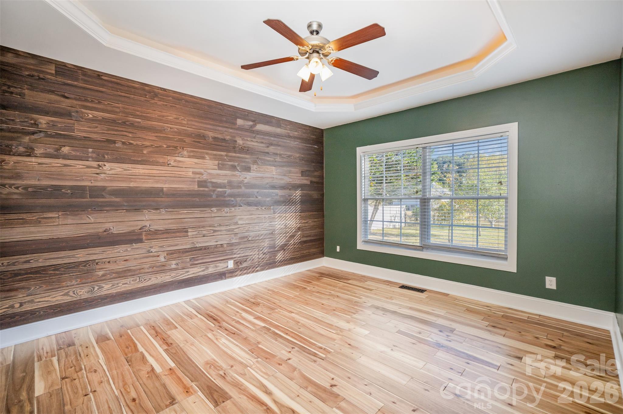 2870 Harmony Road Rock Hill, SC 29730 - Photo 10 of 26 a view of an empty room with a window and a chandelier