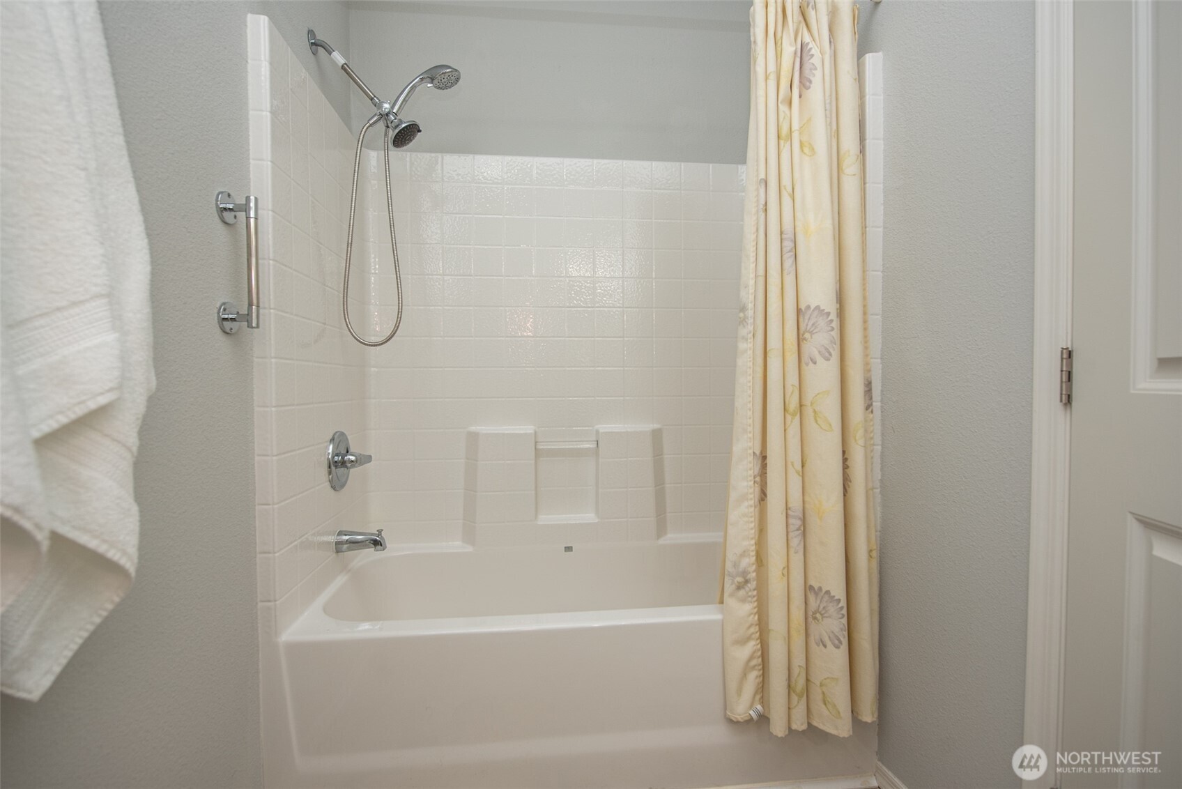 720 West Heritage Loop Sequim, WA 98382 - Photo 26 of 35 a bathroom with a bathtub and a shower