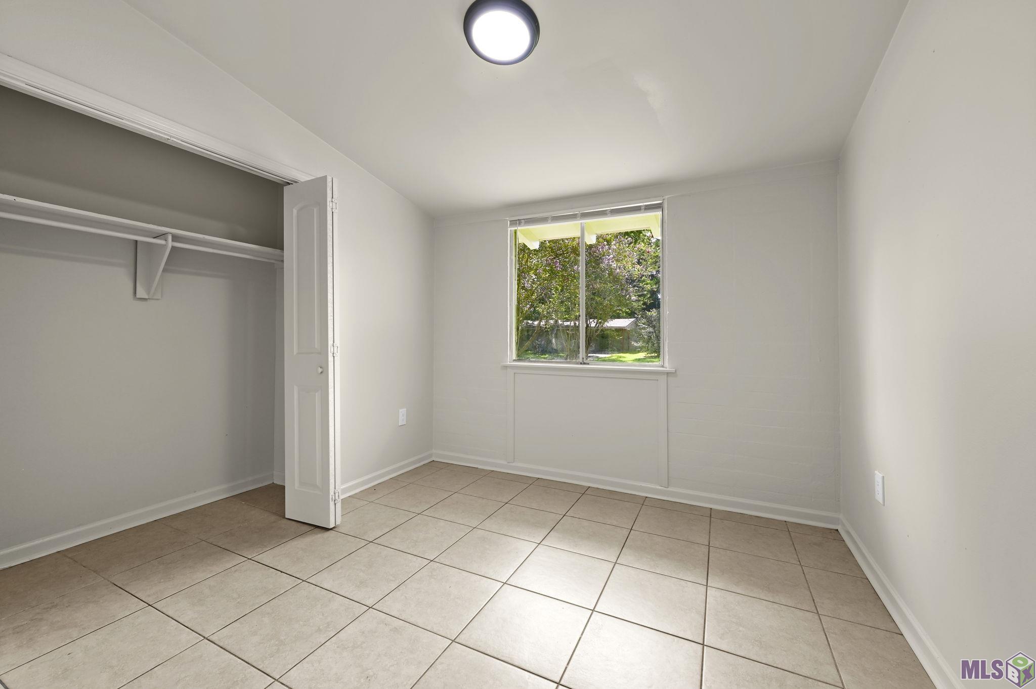 11733 Biscayne Drive Baton Rouge, LA 70814 - Photo 17 of 20 Guest Bedroom