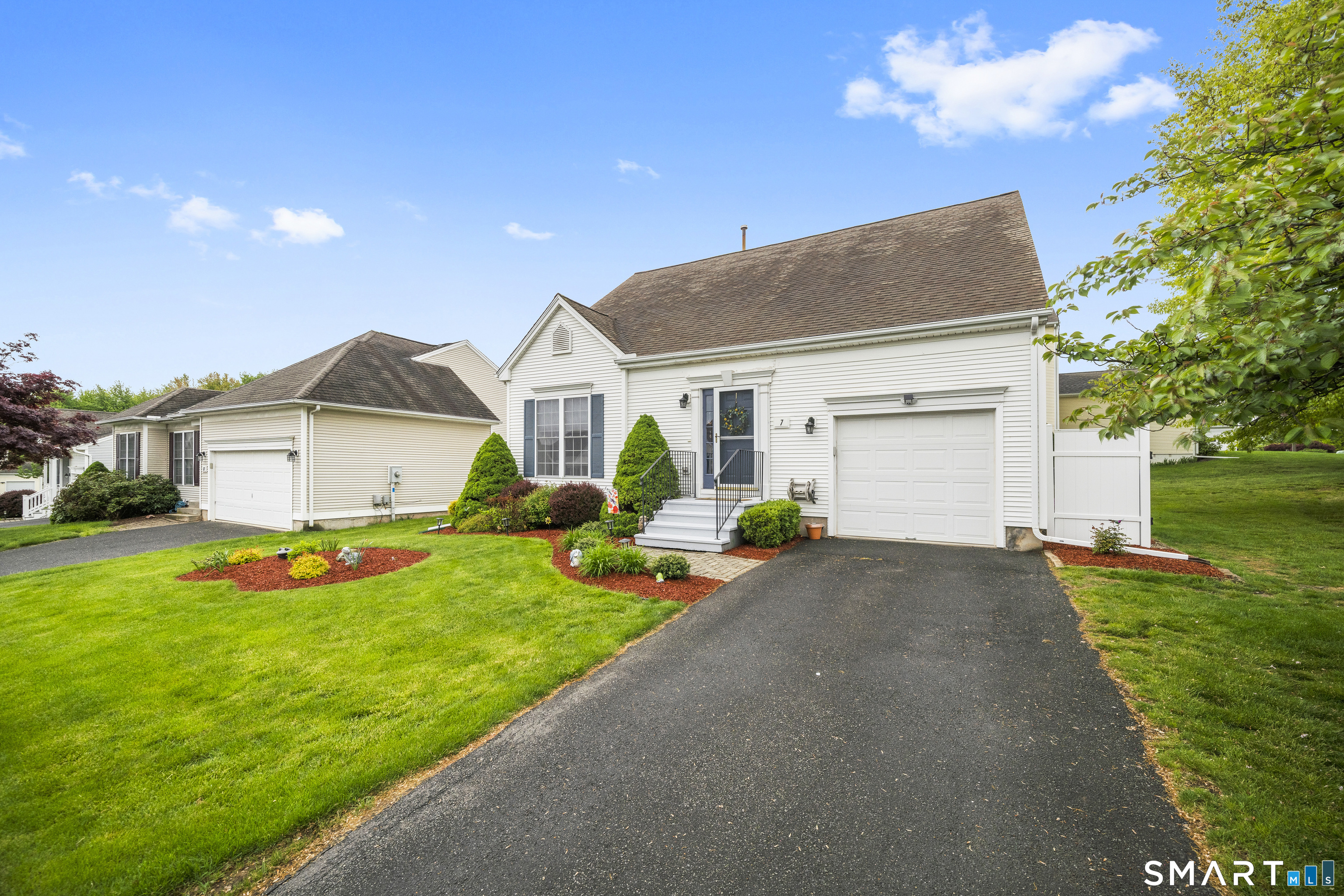 7 Heather Lane, Unit 7 Suffield, CT 06078 - Photo 2 of 34 a front view of house with yard