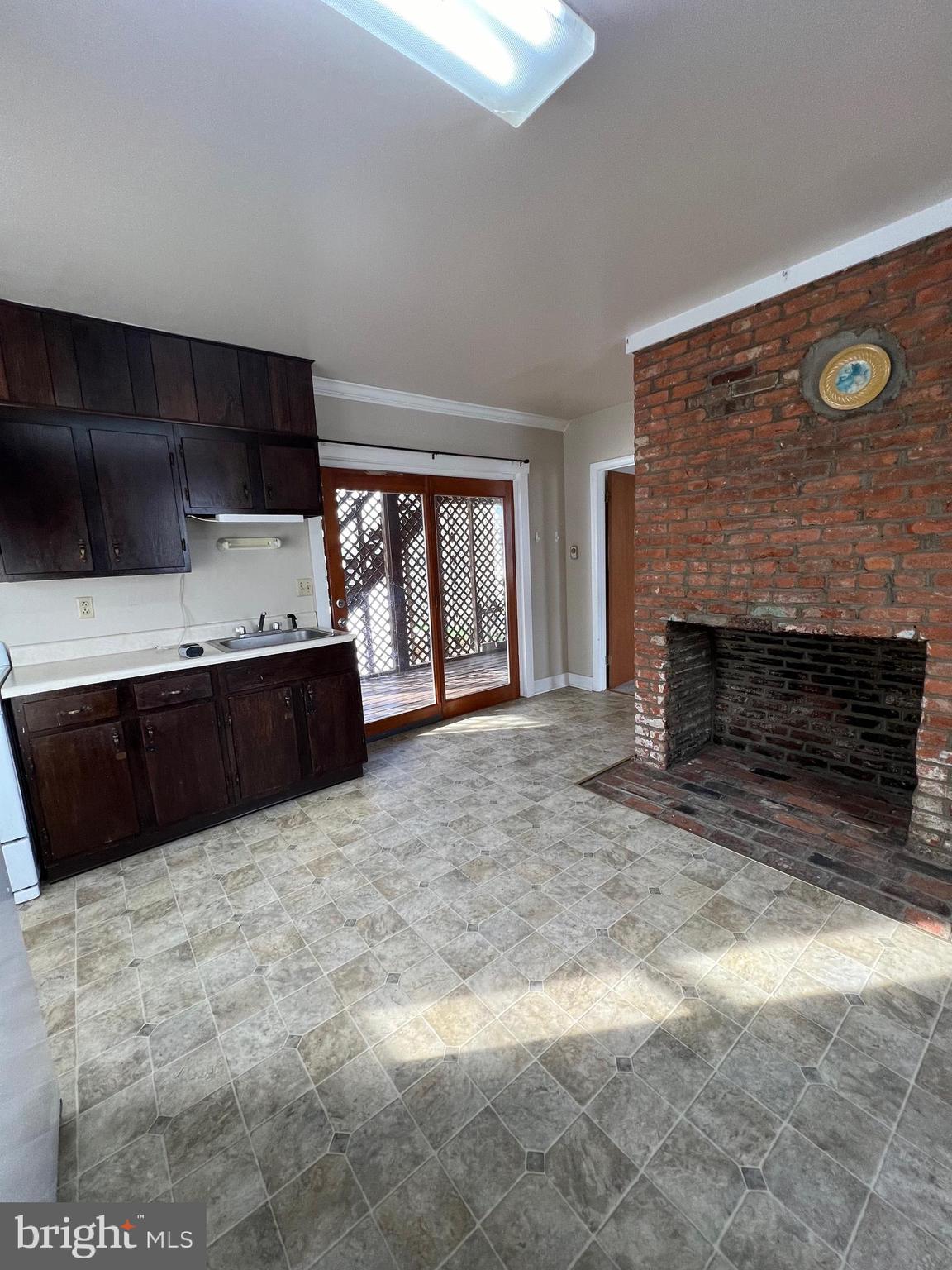 1354 Wiltshire Road, Unit 2 Kearneysville, WV 25430 - Photo 5 of 6 a view of an empty room with a fireplace and a window