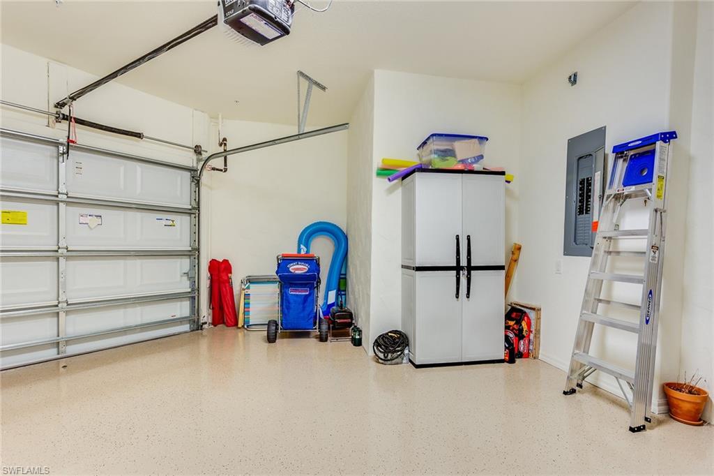 9082 Capistrano Street North, Unit 485 Naples, FL 34113 - Photo 15 of 16 a view of a room with gym equipment