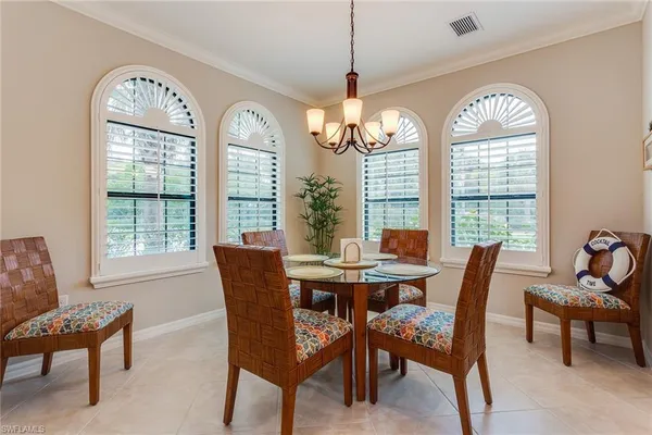 a kitchen with granite countertop kitchen island a counter space a sink appliances and cabinets