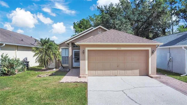 $309,500 | 12909 Odyssey Lake Way, Orlando, FL 32826