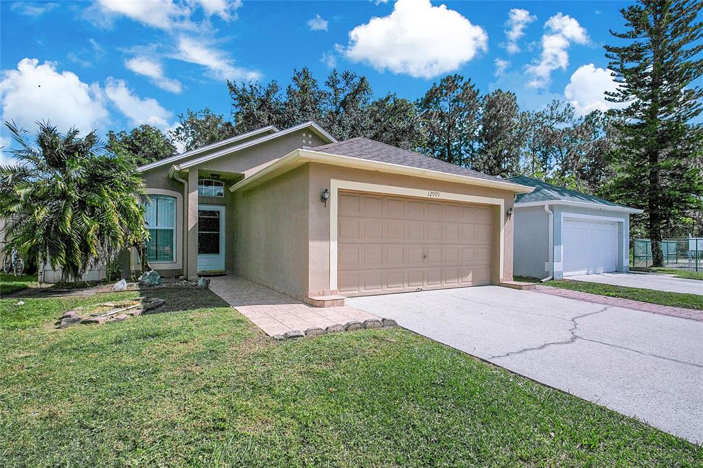 12909 Odyssey Lake Way Orlando, FL 32826 - Photo 2 of 29