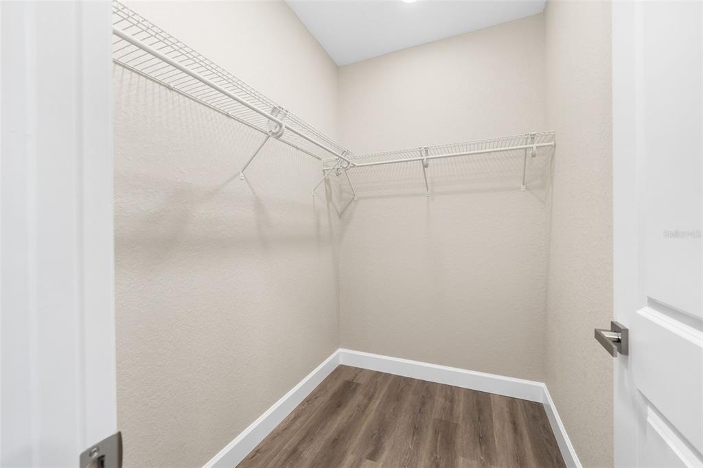 2016 Northeast 3rd Avenue Gainesville, FL 32641 - Photo 18 of 35 a view of a room with racks on the wall