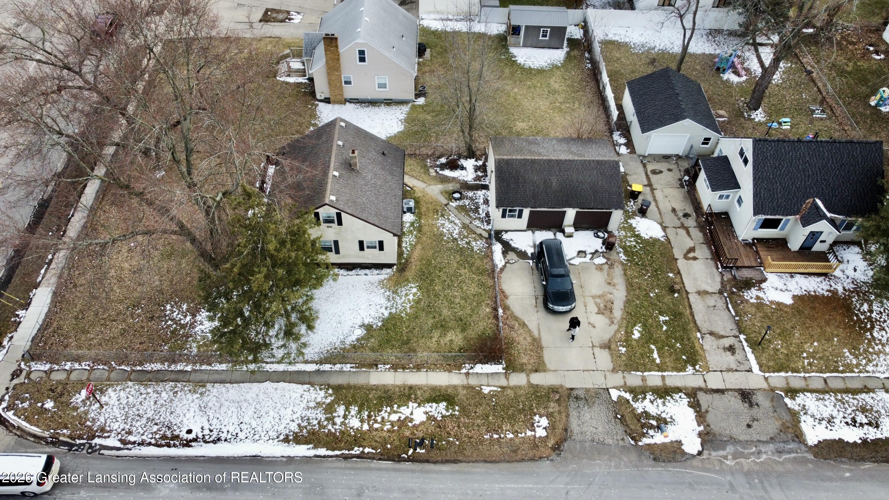 2201 North Aurelius Road Holt, MI 48842 - Photo 6 of 26 dji_fly_20260226_162724_41_1773859543999