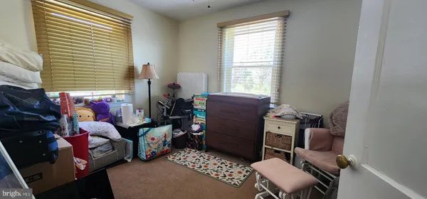 a room with furniture and a window