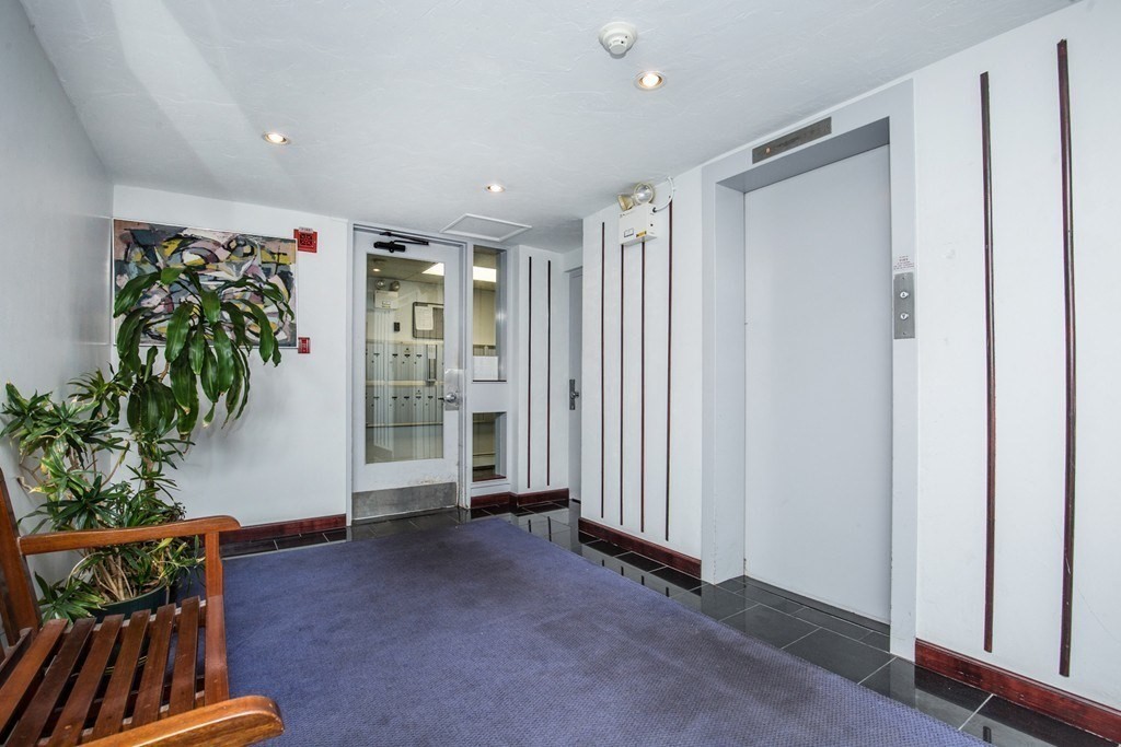 12 Inman Street, Unit 52 Cambridge, MA 02139 - Photo 7 of 12 a view of entryway with stairs