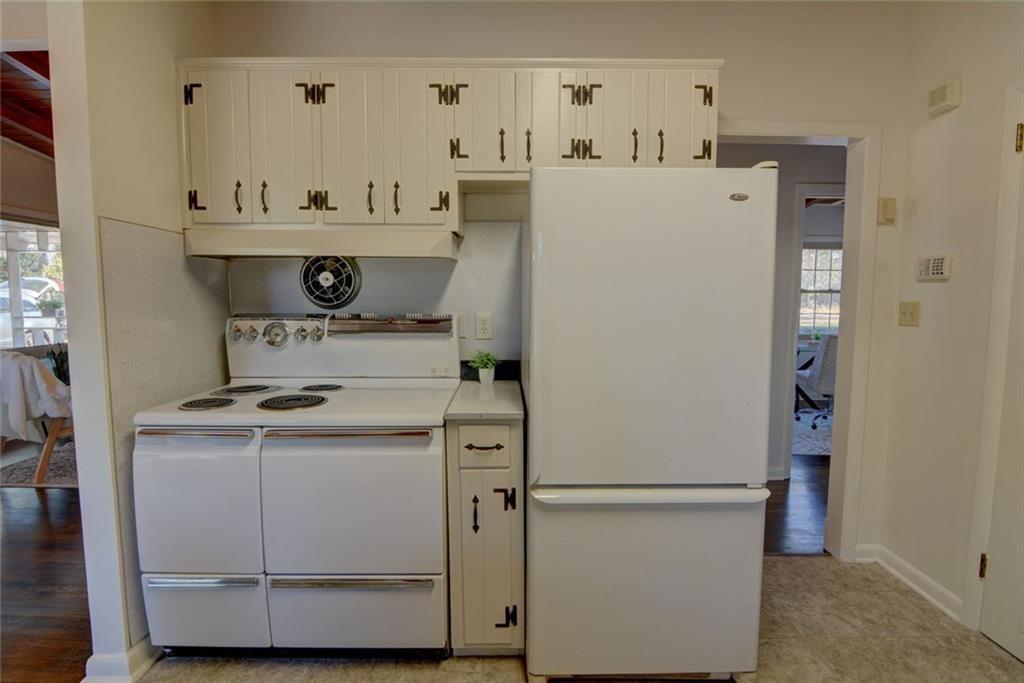 3206 Laventure Drive Chamblee, GA 30341 - Photo 15 of 39 a white refrigerator freezer sitting inside of a kitchen