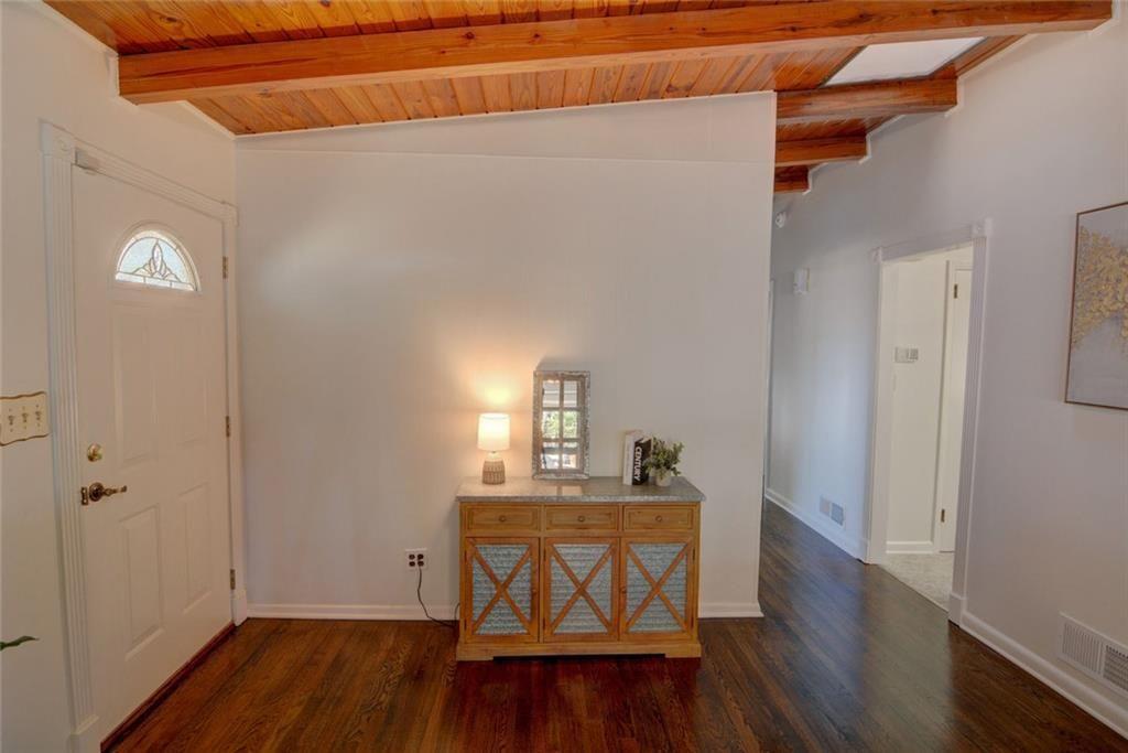 3206 Laventure Drive Chamblee, GA 30341 - Photo 18 of 39 a view of a workspace with wooden floor windows and a bathroom