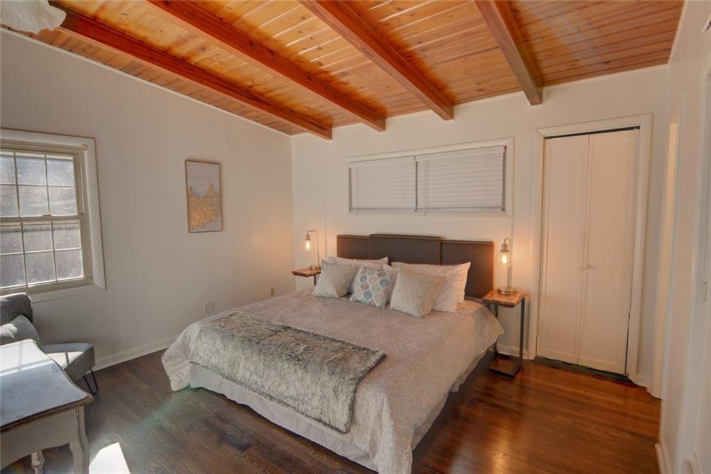 3206 Laventure Drive Chamblee, GA 30341 - Photo 19 of 39 a bed sitting in a bedroom next to a window