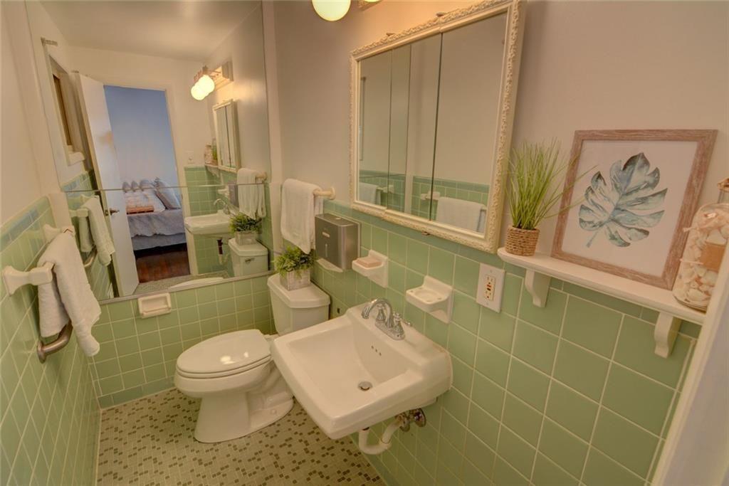 3206 Laventure Drive Chamblee, GA 30341 - Photo 21 of 39 a bathroom with a toilet sink and shower