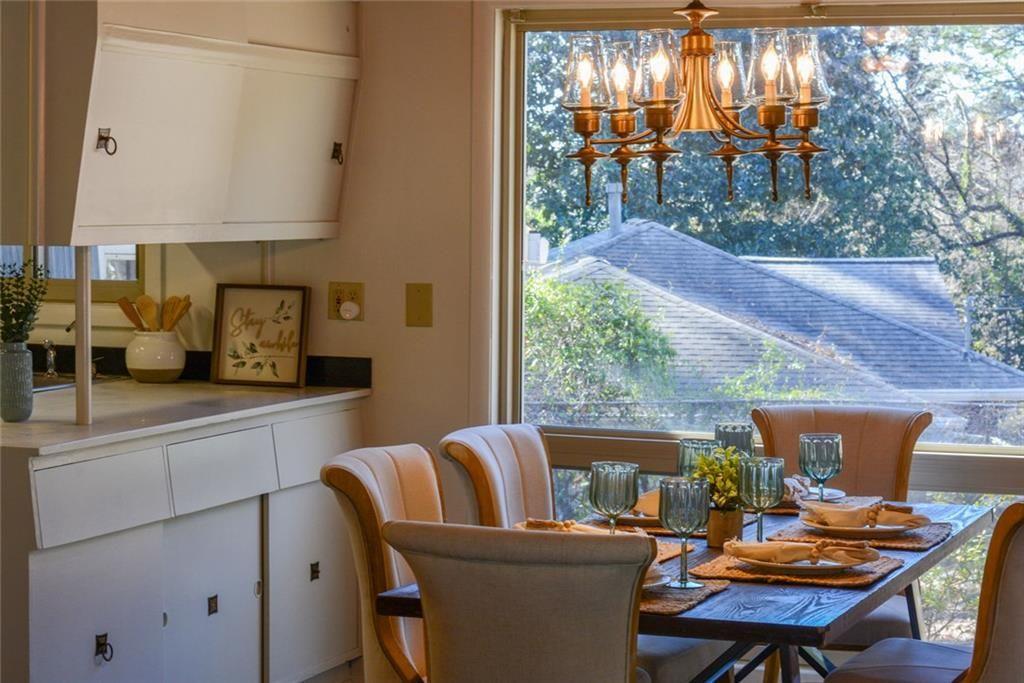 3206 Laventure Drive Chamblee, GA 30341 - Photo 3 of 39 a view of a dining room with furniture window and outside view