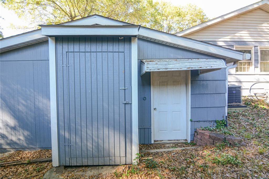 3206 Laventure Drive Chamblee, GA 30341 - Photo 36 of 39 a wooden door in front of a house