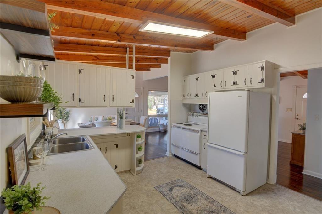 3206 Laventure Drive Chamblee, GA 30341 - Photo 4 of 39 a view of a kitchen with refrigerator and cabinets
