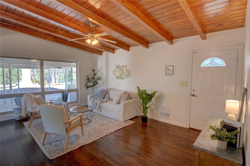 3206 Laventure Drive Chamblee, GA 30341 - Photo 6 of 39 a living room with furniture and wooden floor