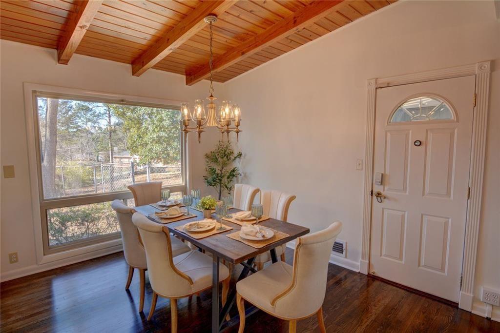 3206 Laventure Drive Chamblee, GA 30341 - Photo 8 of 39 a view of a dining room with furniture window and wooden floor