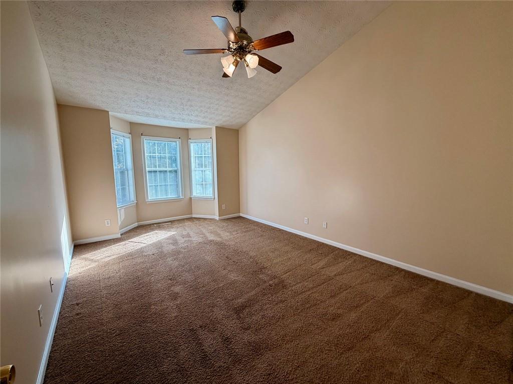 604 Victorian Circle Dallas, GA 30157 - Photo 11 of 25 wooden floor in an empty room with a window
