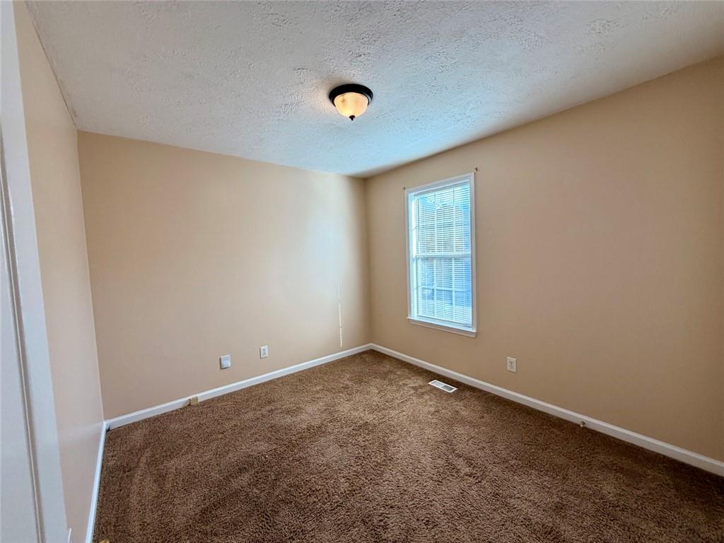 604 Victorian Circle Dallas, GA 30157 - Photo 15 of 25 an empty room with windows