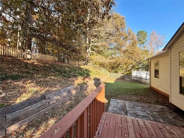 a view of a back yard of the house